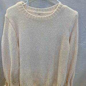 Sweater with ties at sleeves